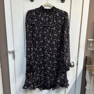 CeCe black floral dress. Cute ruffle on bottom. High neck. Lined. Medium.